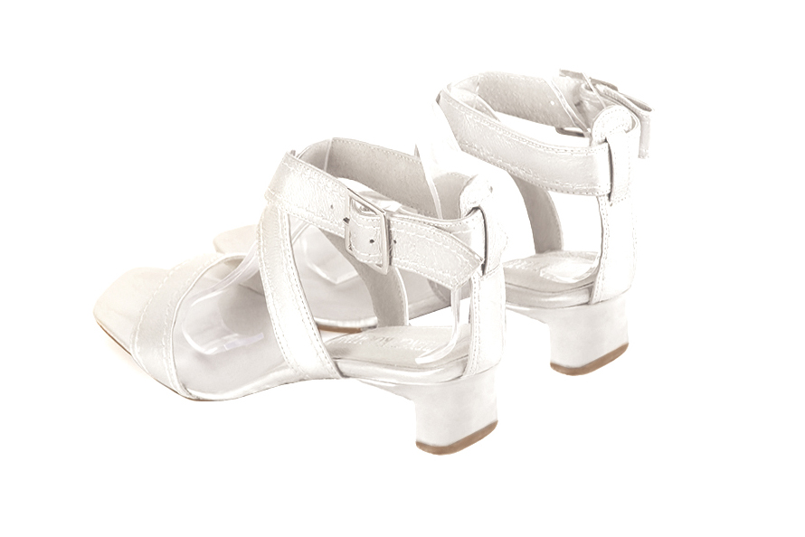 Women's pure white elegant fully open cross straps sandals. Square toe. Low kitten heels - Rear view
